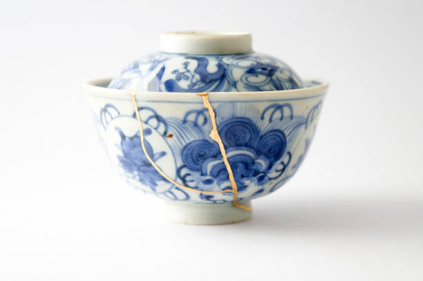 istock Antique broken Japanese blue bowl repaired with gold kintsugi technique 1280390344