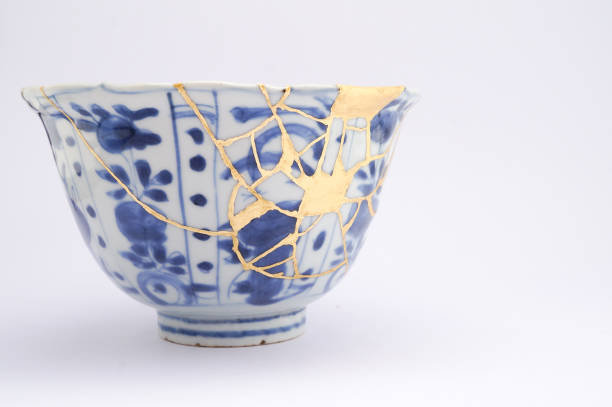 istock Antique broken Japanese blue bowl repaired with gold kintsugi technique 1280391341