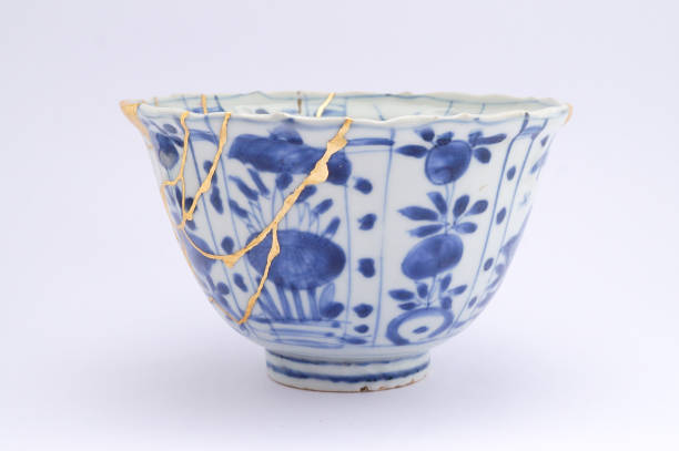 istock Antique broken Japanese blue bowl repaired with gold kintsugi technique 1280391342