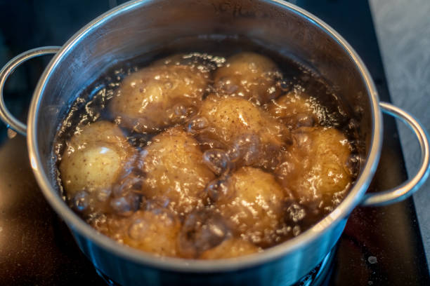 istock cooking potatoes in boiling water 1280392331