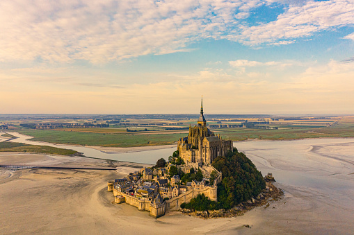 Mont Saint Michel aerial views at sunset in Normandy France