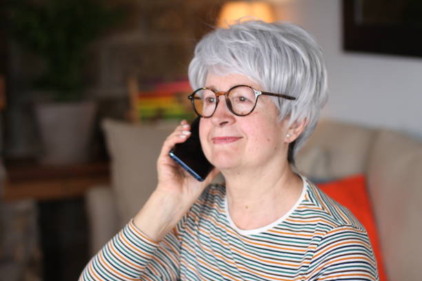 istock Senior woman calling from home 1280392513