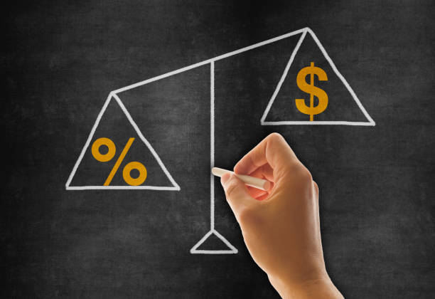 istock Hand drawing scale concept, Percentage and Dollar symbol unbalanced 1280393398