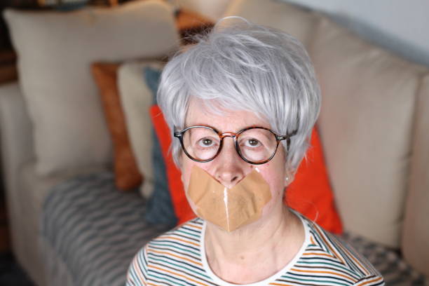 istock Silenced senior woman at home 1280393568