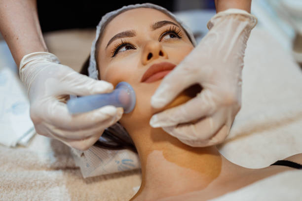 istock Young woman having a relaxing face massage 1280395427