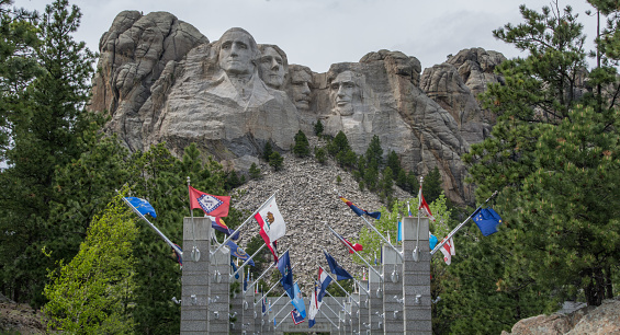 Mount Rushmore with state flags