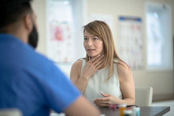 istock Discussing a sore throat at a doctor's appointment 1280399447