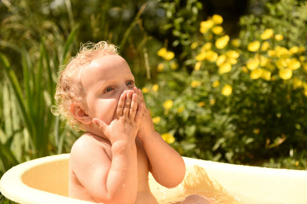 istock Little girl has fun in the bath at yard. 1280400067