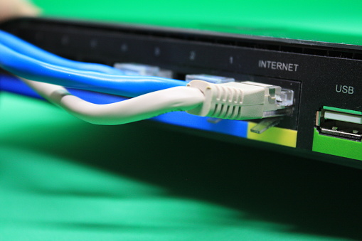 Internet router on a green background