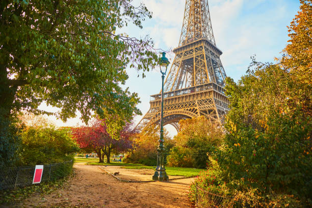 istock Scenic view of the Eiffel tower and Champ de Mars park on a fall day 1280407611