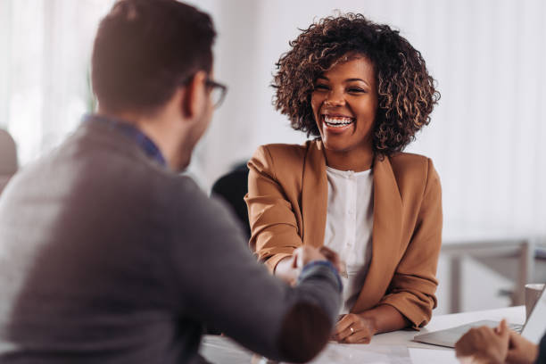 istock Business people shaking hands after meeting 1280412225