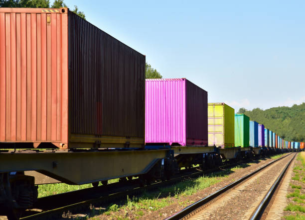 istock Cargo Containers Transportation On Freight Train By Railway. Intermodal Container On Train Car. Rail Freight Shipping 1280413106