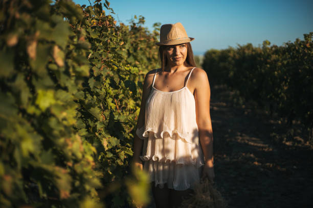istock Woman in vineyard 1280413819