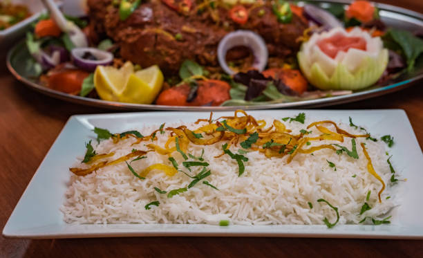 istock Big lamb leg roasted with Indian spices 1280418495