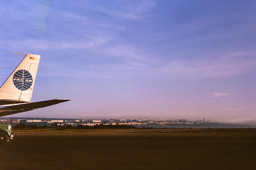 Vintage air travel with Pan Am airlines during the 1950's. Pan American World Airways, originally founded as Pan American Airways and commonly known as Pan Am, was the principal and largest international air carrier and unofficial flag carrier of the United States from 1927 until its collapse on December 4, 1991. It was founded in 1927 as a scheduled air mail and passenger service operating between Key West, Florida, and Havana, Cuba.