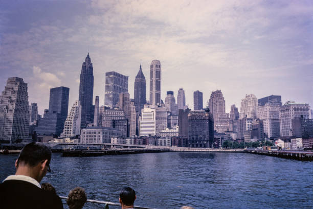 Manhattan Skyline with world trade center Twin Towers from liberty island in early 1990s