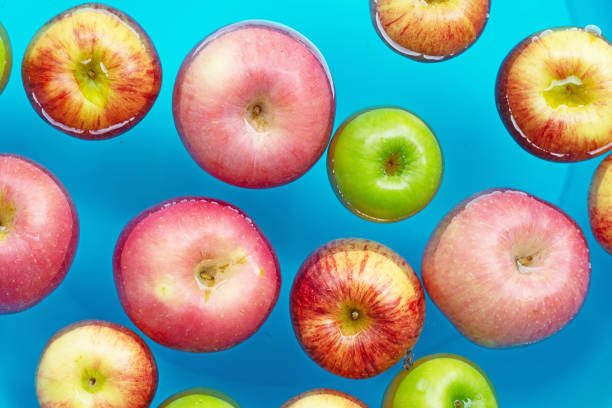 istock Washing fresh apples in the water 1280427056