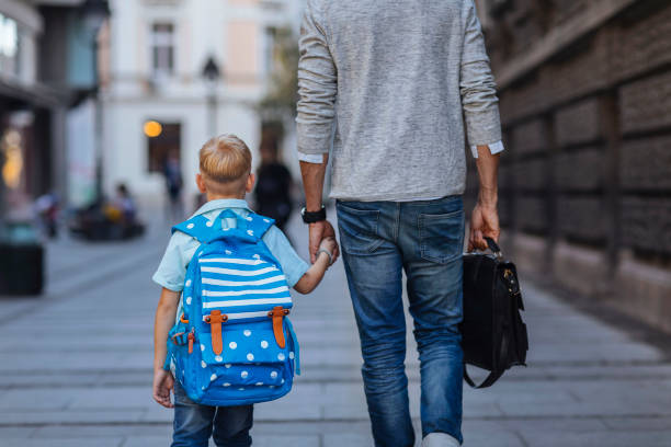 istock One day he will be as tall as his dad 1280427079