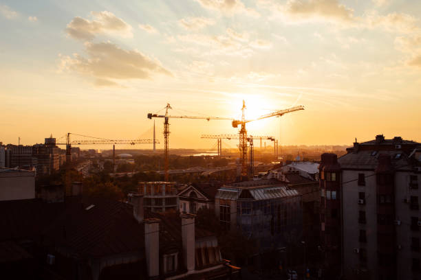 istock Sun setting behind the skyline of a city 1280427634