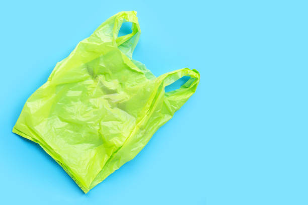 istock Colorful plastic bags on blue background. 1280428904
