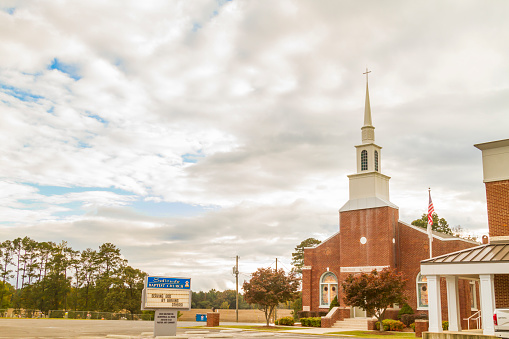 September 19, 2020 - Albertville, Alabama, USA: General view of middle-class neighborhood with an iconic church in Alabama, USA in a cloudy autumn day.