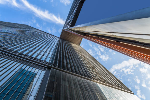 istock Modern office building from below Skyscrapers in a finance district 1280438497