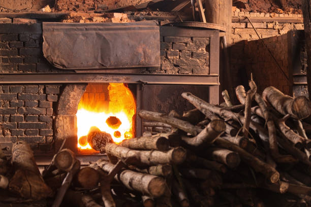 istock Firewood burning in industrial oven. Brick yard. 1280440823
