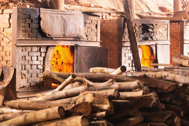 istock Firewood burning in industrial oven. Brick yard. 1280440830