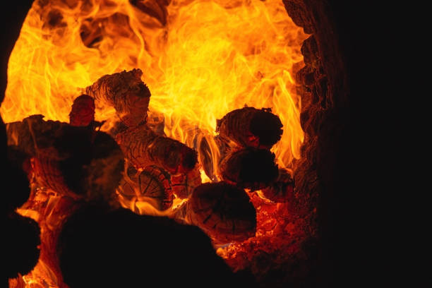 istock Firewood burning in industrial oven. Brick yard. 1280440915