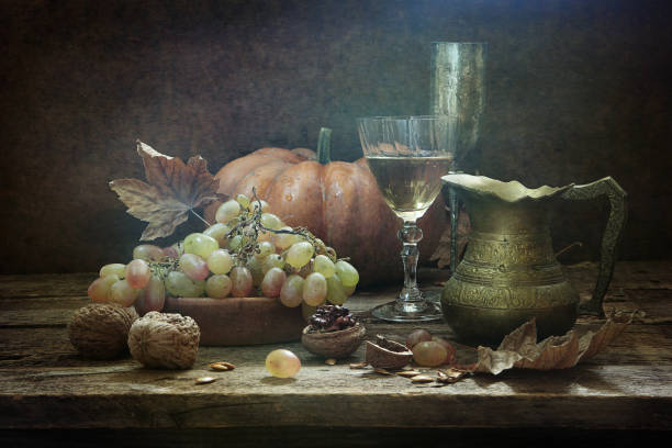 istock Still-life with wine, walnuts and grapes 1280446999