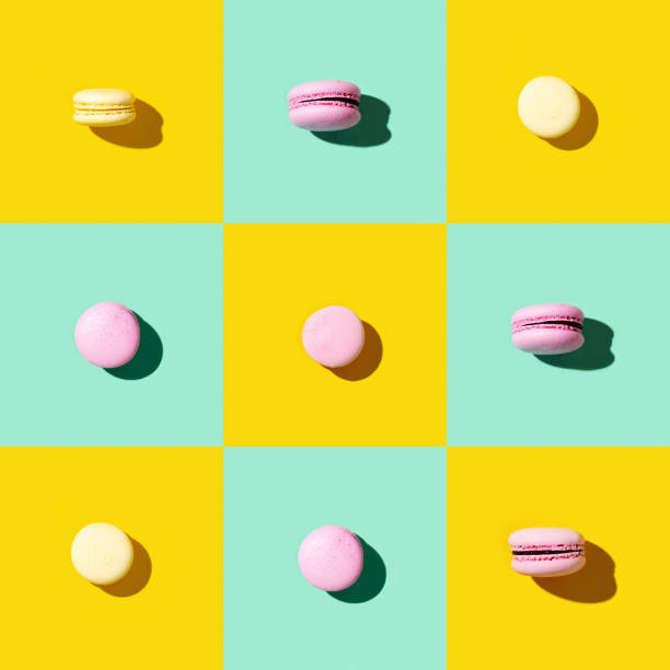 istock Regular creative pattern of colorful french cookies macarons. Pop art style banner. 1280450298