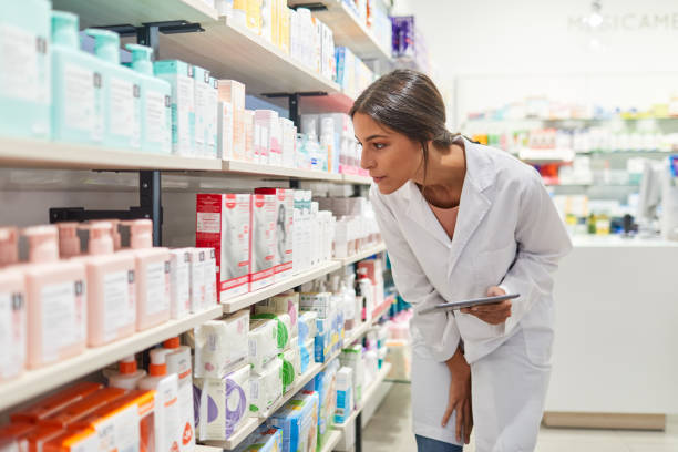 istock A young spanish female pharmacist searching for a medicine 1280450670
