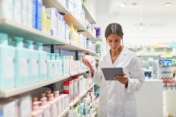 istock A young female pharmacist reading a prescription on a digital tablet 1280450674