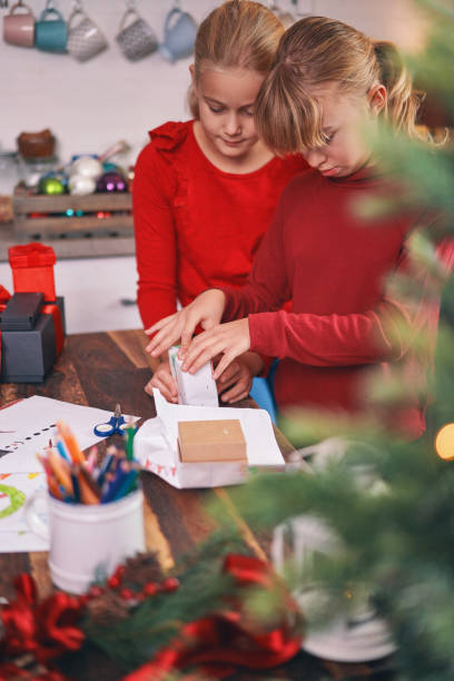 istock Wrapping and Decorating Christmas Presents 1280451330
