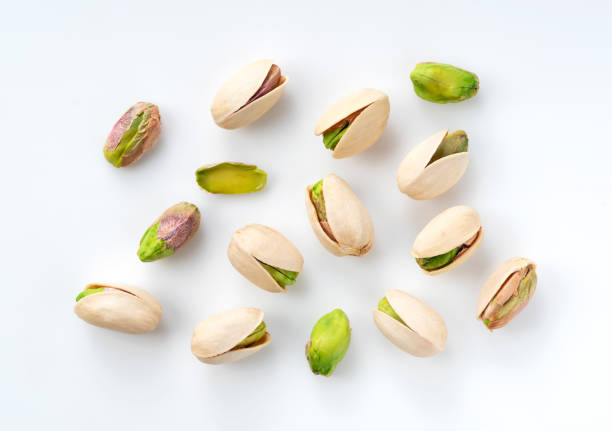 istock A bird's-eye view of pistachios on a white background 1280452222