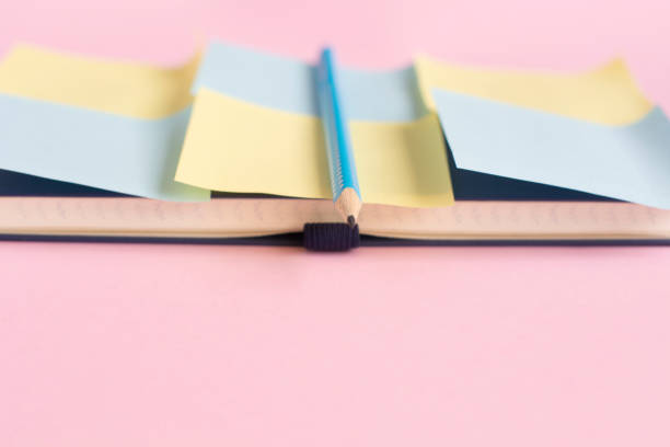 istock stationery minimal concept on pink background. Notepad with with stickers for notes. Copy space place for text. 1280452496