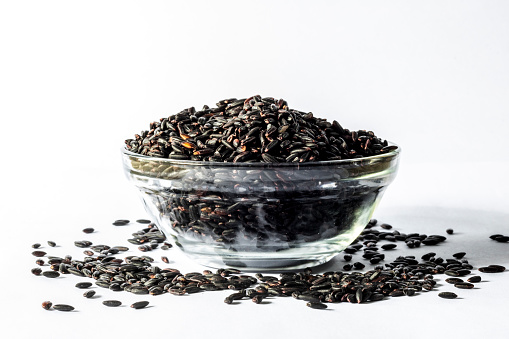 Black venus integral rice on glass bowl isolated on white background in Brazil