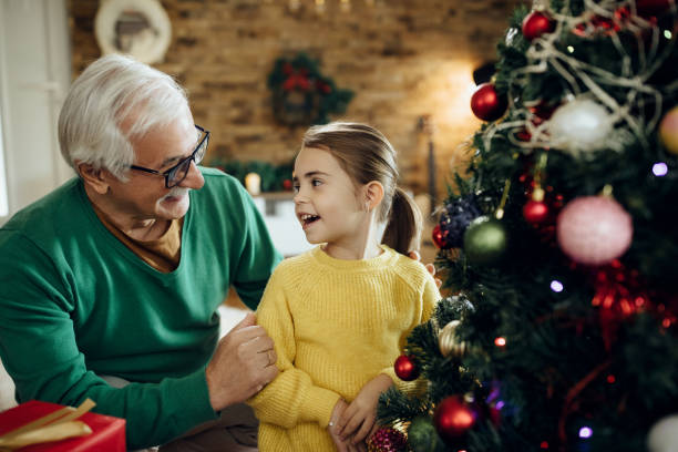 istock Grandpa, our Christmas tree will be the most beautiful! 1280455175