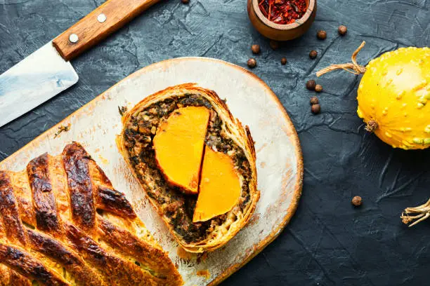 Wellington pumpkin,loaf of bread stuffed with baked mushrooms and pumpkin.