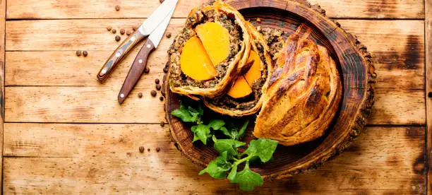 Wellington pumpkin,loaf of bread stuffed with baked mushrooms and pumpkin.