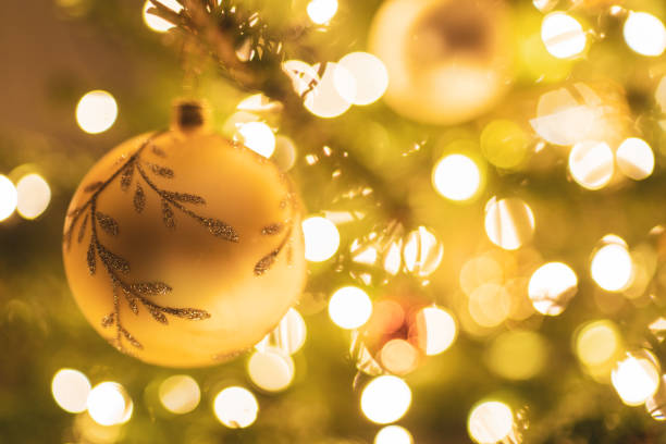 istock christmas ornament on fir tree 1280459641