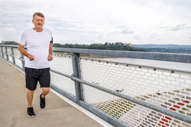 istock Man jogging outdoors 1280462293