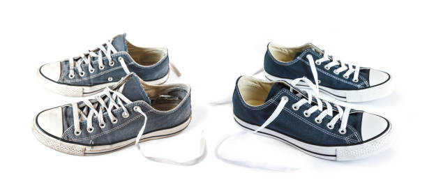 istock New and old blue sneakers isolated on white background 1280462453