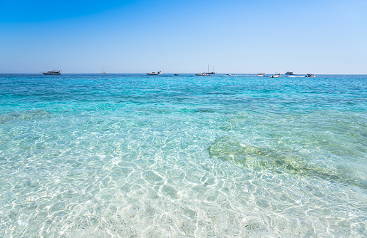 Clear amazing azure coloured sea water at Gulf of Orosei, Sardinia, Italy