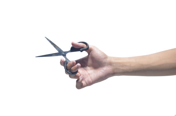 istock Person right hand using black scissor on isolated white background 1280464907