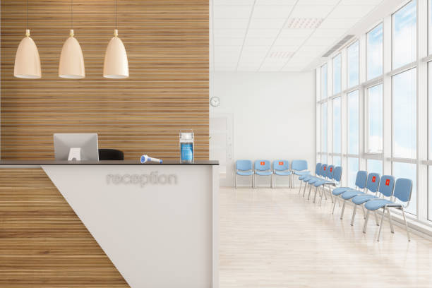 istock Hand Sanitiser And Thermometer On Reception Desk And Blue Chairs Arranged According To New Normal 1280464951