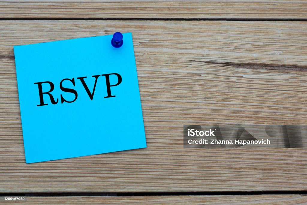 RSVP - acronym written on a blue sheet pinned to a wooden board RSVP is an acronym written on a blue sheet attached to a wooden board. Holiday concept Color Image Stock Photo