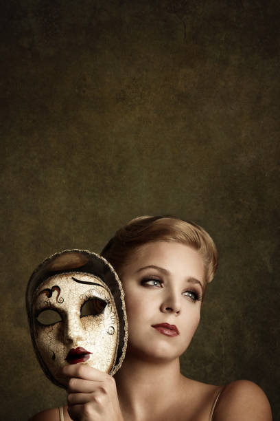 istock Woman with carnival mask 1280467115