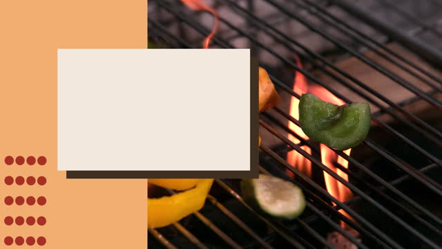 White blank board and orange stripe against vegetables on BBQ grill