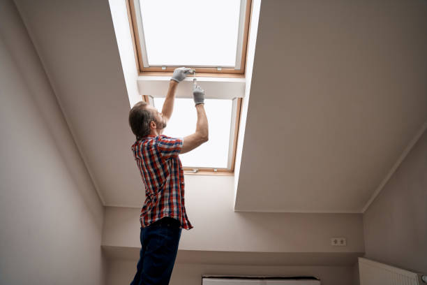 istock Young caucasian repairman screwing handle on skylight window 1280468371
